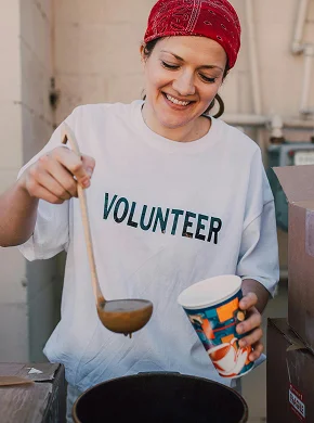 CAN field workers loading relief supplies onto truck